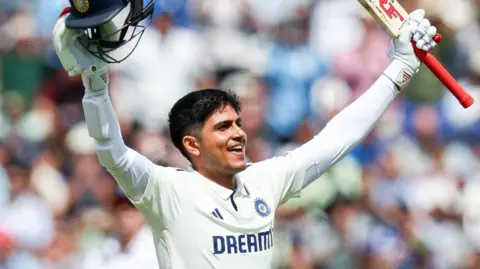 A smiling Shubman Gill celebrates during his 267 against England