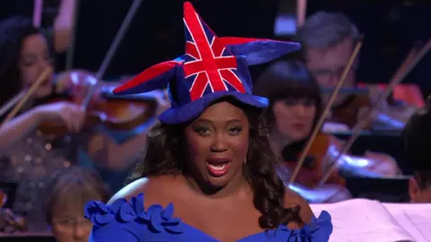 BBC Angel Blue performs at the Last Night of the Proms, wearing a Union Jack jester's hat