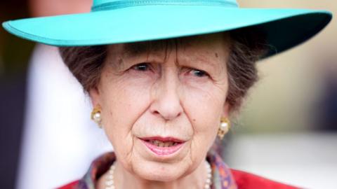 Princess Anne, wearing a green hat and red dress, pictured on day one of Royal Ascot at Ascot Racecourse, Berkshire. 18 June 2024