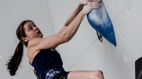 Climber Erin McNeice competing at the 2024 Olympic Qualifier Series event in Budapest