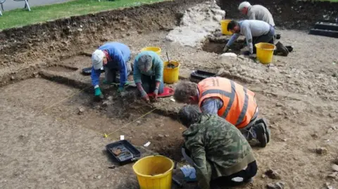 Chichester District Council An archaeological dig taking part to uncover remains of a Norman Castle in Chichester's Priory Park