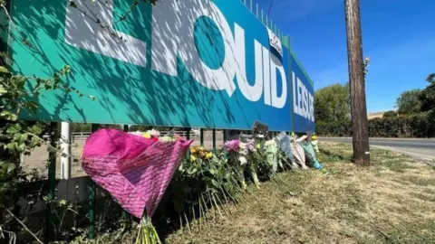 Floral tributes outside Liquid Leisure