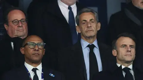 AFP (first row from L) French Football Federation (FFF) President Philippe Diallo, French President Emmanuel Macron, (second row from L) former French President Francois Hollande and former French President Nicolas Sarkozy pose ahead of the UEFA Nations League A, Group A2 football match between France and Israel at the Stade de France stadium in Saint-Denis, on the northern outskirts of Paris, on November 14, 2024. (