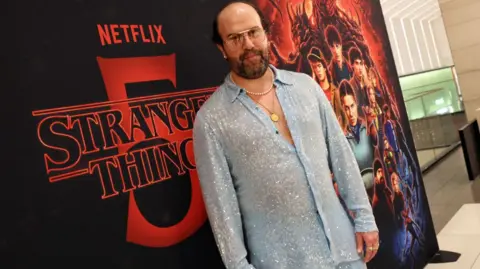 Getty Images Brett Gelman attends Stranger Things 5: The Finale Fan Screenings at AMC Topanga 12 on December 31, 2025 in Topanga, California