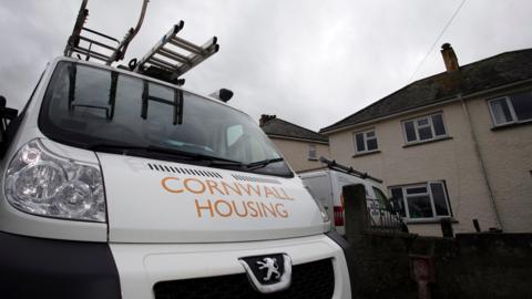 A Cornwall Housing van outside a house