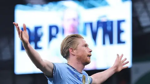 Kevin de Bruyne celebrates