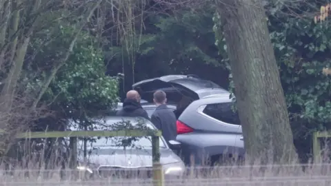 Vehicles arrive at Sandringham Estate