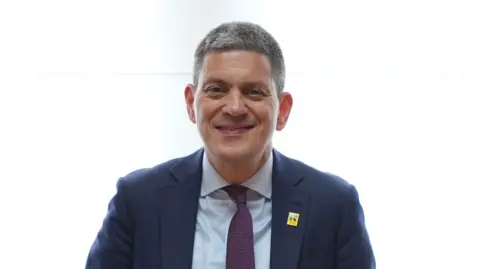 David Miliband after delivering a speech at RUSI in Whitehall, London, on the growing humanitarian crises in the Middle East, the emerging new global order and the potential role of 'middle powers' including the UK. Picture date: Wednesday May 20, 2026. PA Photo.