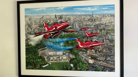 Shaun Whitmore/BBC A painting of the Red Arrows, with central London the backdrop