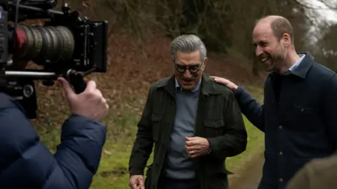 AppleTV+/PA Prince William talking with Eugene Levy
