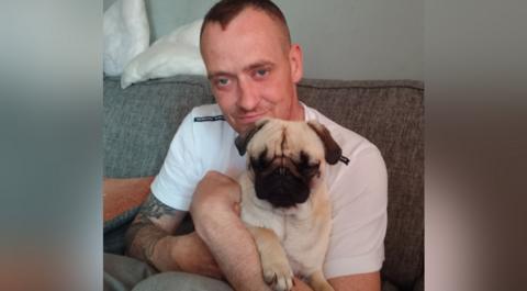 Stephen Robson with a pug