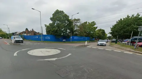 Google The junction of Molly Millars Lane and Finchampstead Road in Wokingham.