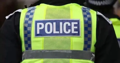 Getty Images Police officer in hi vis 