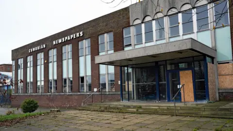 LDRS A general view of Newspaper House before its demolition