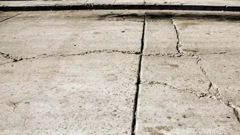 Cracks on a pavement. 