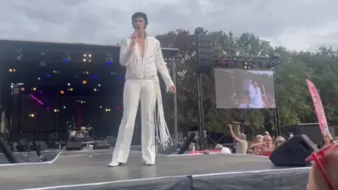 Supplied Lewis on stage