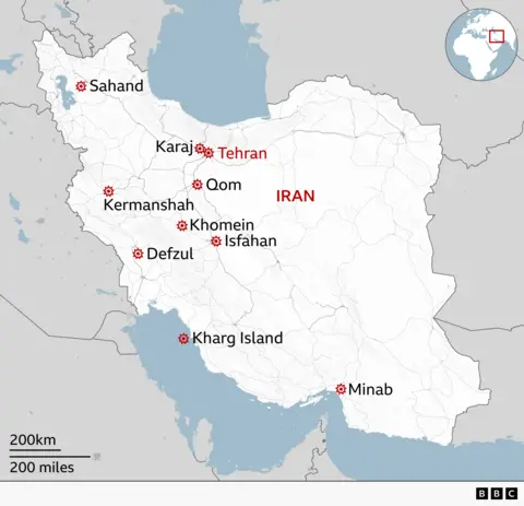 Map of Iran showing Tehran in the north of the country, with Karaj just to the west of the capital, Qom to the south, Isfahan further south in central Iran, and Kermanshah in the west near the border with Iraq. Kharg Island on the western coast is also marked.
