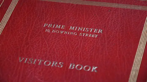 10 BBC cover of a volume of the Downing Street Visitors Book