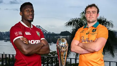 Lions captain Maro Itoje and Australia skipper Harry Wilson pose with the series trophy