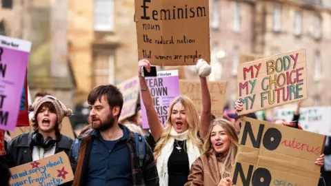 Getty Images A number of people at a Women's March event in Edinburgh