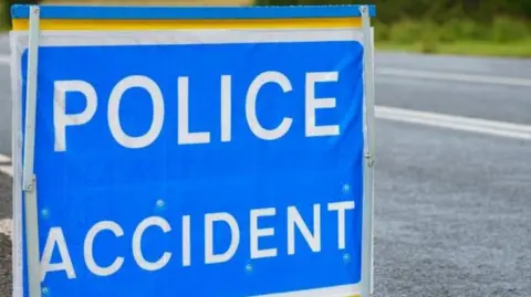 Getty Images A police accident sign pictured in close-up at the side of a road