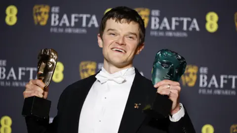 EPA Robert Aramayo at the Baftas