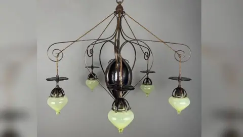 Supplied A green chandelier