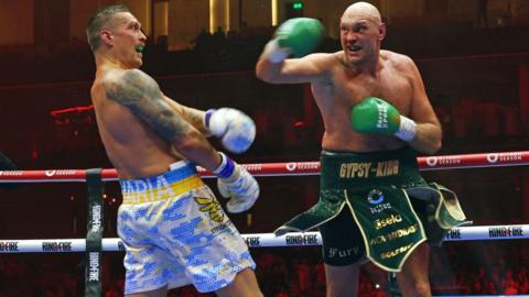 Oleksandr Usyk dodges a punch from Tyson Fury