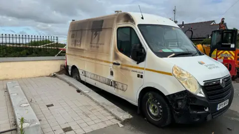 Gaz Oakley A SP Energy Network work van at the scene of the fire 