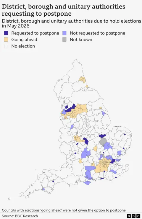 A map of district, borough and unitary authorities in England that have requested to postpone their elections to May 2026. The map also includes those who turned down the opportunity and also includes areas where elections are being held normally. At this stage there are 21 authorities who are requesting postponement, 29 who have not requested postponement and 72 who have not been given the option to postpone and the elections are proceeding as normal.