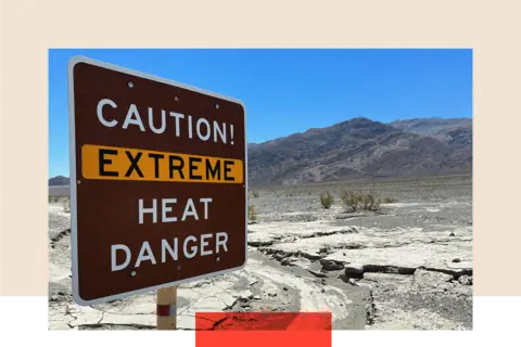 A sign in an arid landscape reads: 'Caution! Extreme heat danger