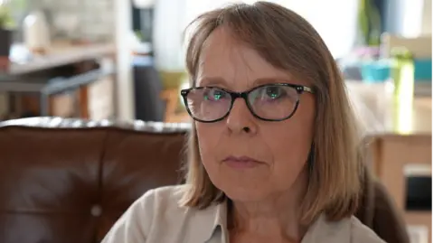 Julie Devey looking into the camera