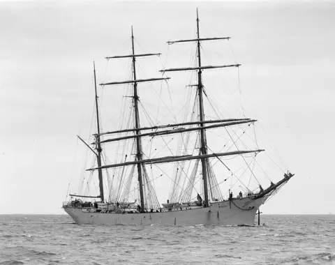 Allan C Green A black and white photo of a three masted sailing ship