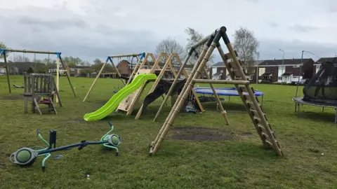 Playground equipment on the site. 