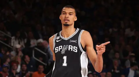 San Antonio Spurs' Victor Wembanyama points