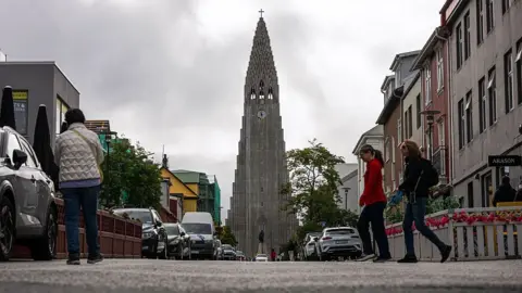 AFP via Getty Images The Hallgrimskirkja church is pictured in Reykjavik, Iceland on August 25, 2026 ahead of the country's upcoming referendum