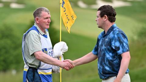 Robert MacIntyre (right) has his father Dougie as his caddy this week