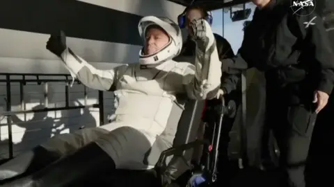 Butch Wilmore reacts after he and Suni Williams and two other astronauts splashed down in a Crew Dragon space capsule.