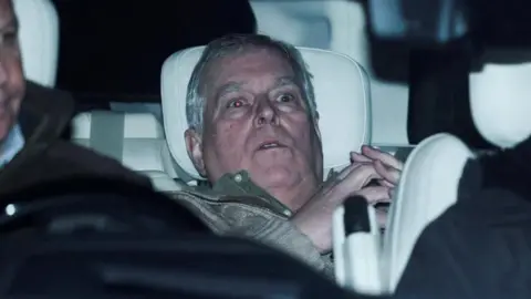 Andrew Mountbatten-Windsor in the back of a car 
