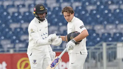 Jofra Archer (left) congratulates James Coles for his Sussex century versus Durham