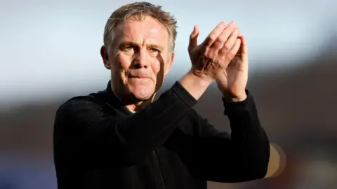 Wrexham boss Phil Parkinson applauds