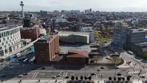 An aerial shot of Canning Place in Liverpool, the Radio City Tower can be seen in the background, with Liverpool ONE to the left of the building and the Baltic Triangle to the right.