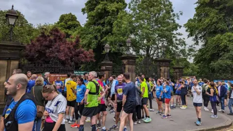 Steve Jones/BBC Runners gather for the run in Leeds