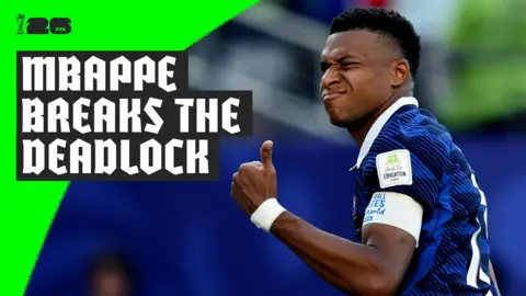 Kylian Mbappe gives the crowd a thumbs up to celebrate scoring a penalty for France against Paraguay in the 2026 World Cup.