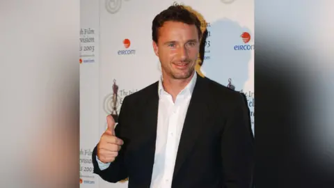  Irish F1 driver Eddie Irvine attends the Irish Film and Television Awards at the Burlington Hotel on November 1, 2003 in Dublin, Ireland. (Photo by ShowBizIreland/Getty Images)