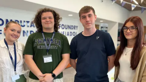 BBC Four students smiling at the camera