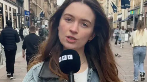 A close-up shot of BBC journalist Rebecca Tierney