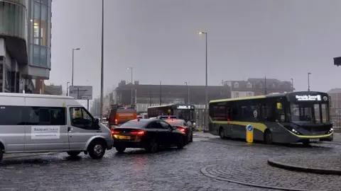 LDRS Traffic queues at the junction of Cookson Street and Talbot Road in Blackpool town centre on a grey, wet day