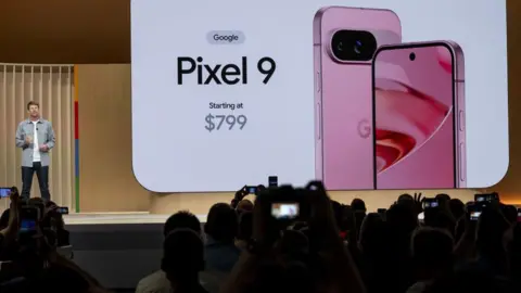 Getty Images Brian Rakowski, vice president of product management for Pixel, unveiling the new Pixel 9 phones.