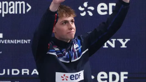 Filip Nowacki celebrates winning European 200m breaststroke gold